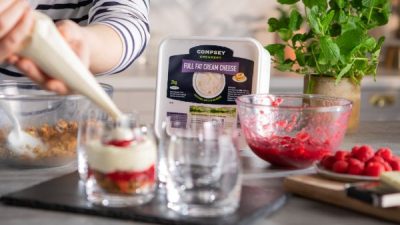 Compsey Creamery full fat cream cheese product on table with dairy desserts