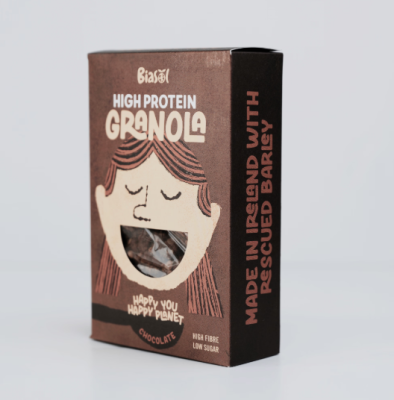 Box of chocolate granola with grey background